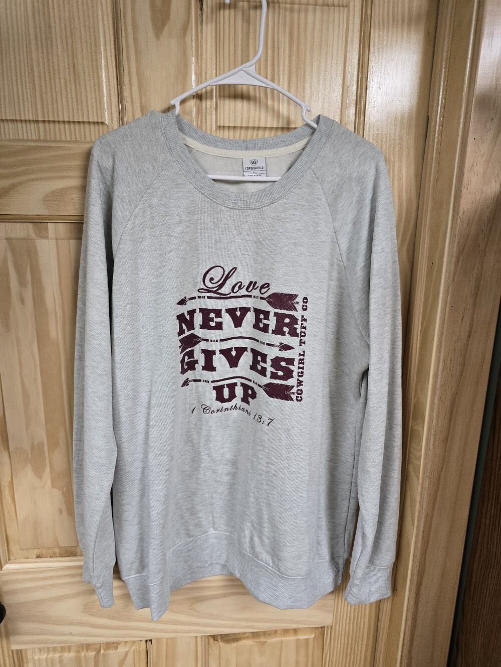 Love Never Gives Up Grey Sweatshirt with Burgundy Graphic